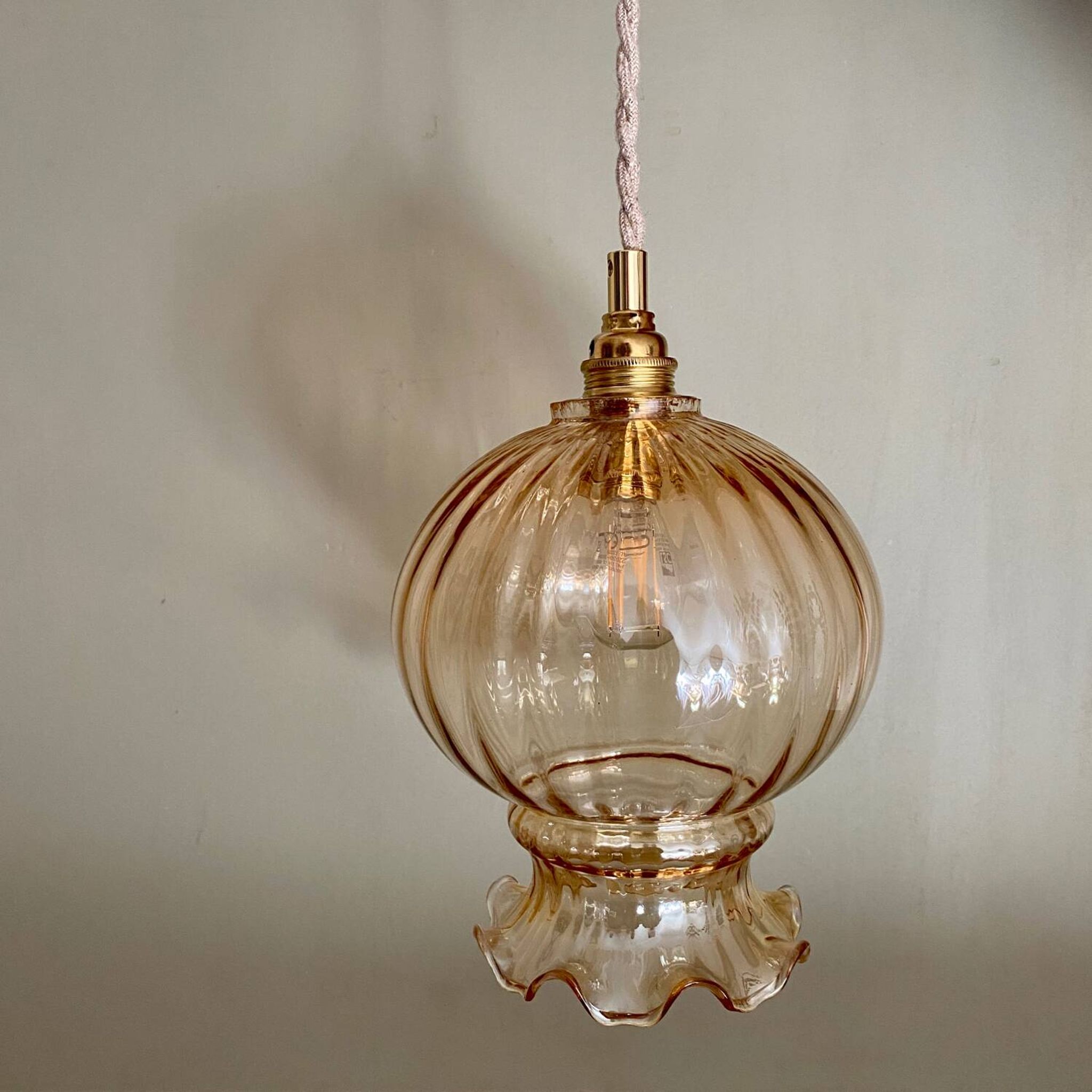Vintage amber glass globe pendant light