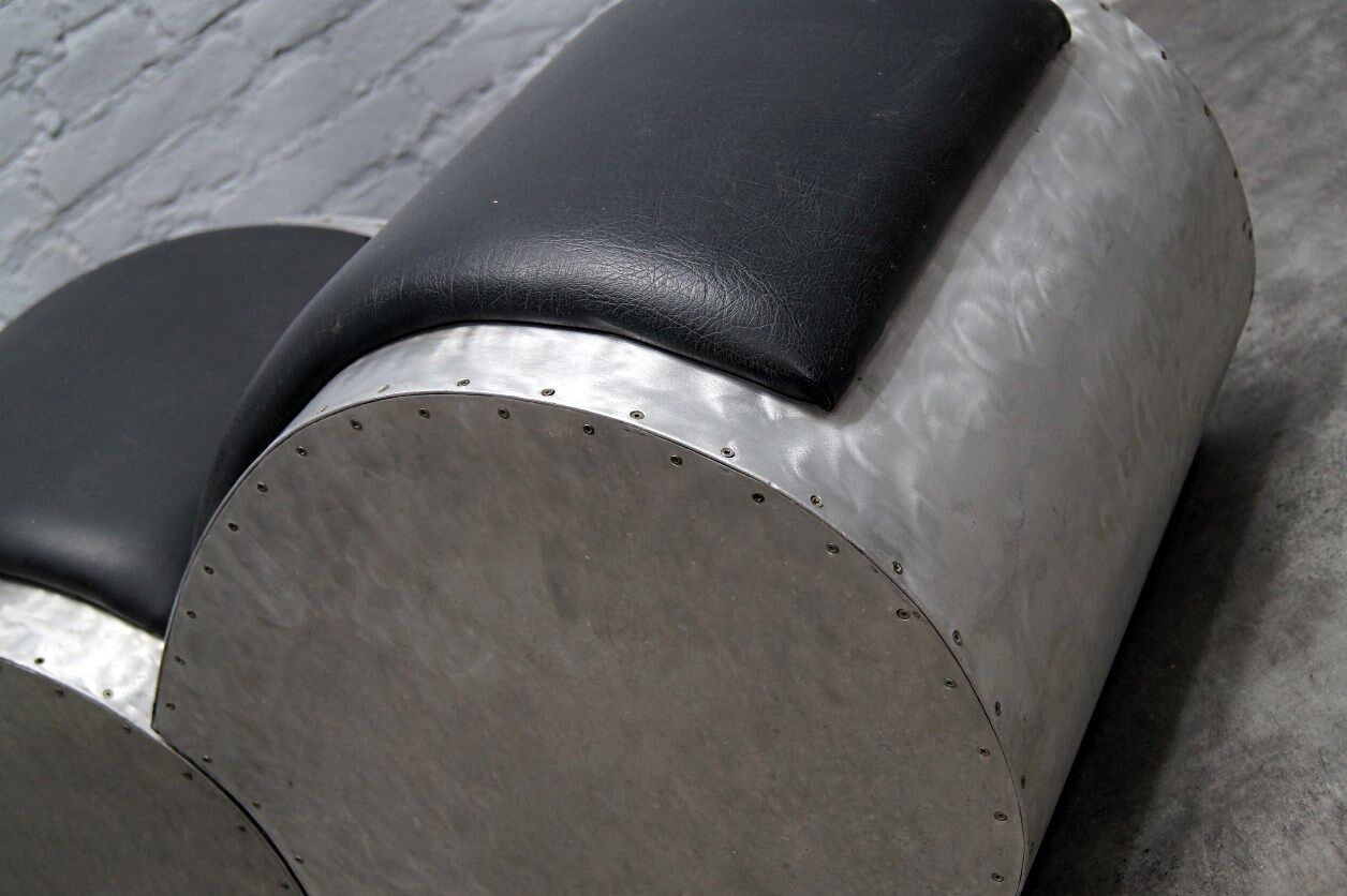 Industrial aluminum & vinyl lounge chair with footrest, 1970s