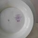 Presentation plate on foot shower