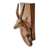 Old antelope bookend in hand carved wood
