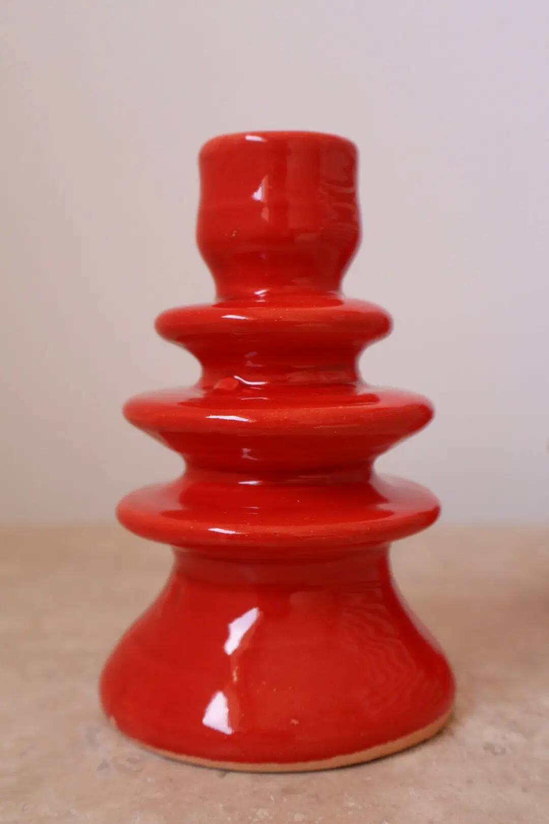 Pair of colorful poppy red ceramic candle holders
