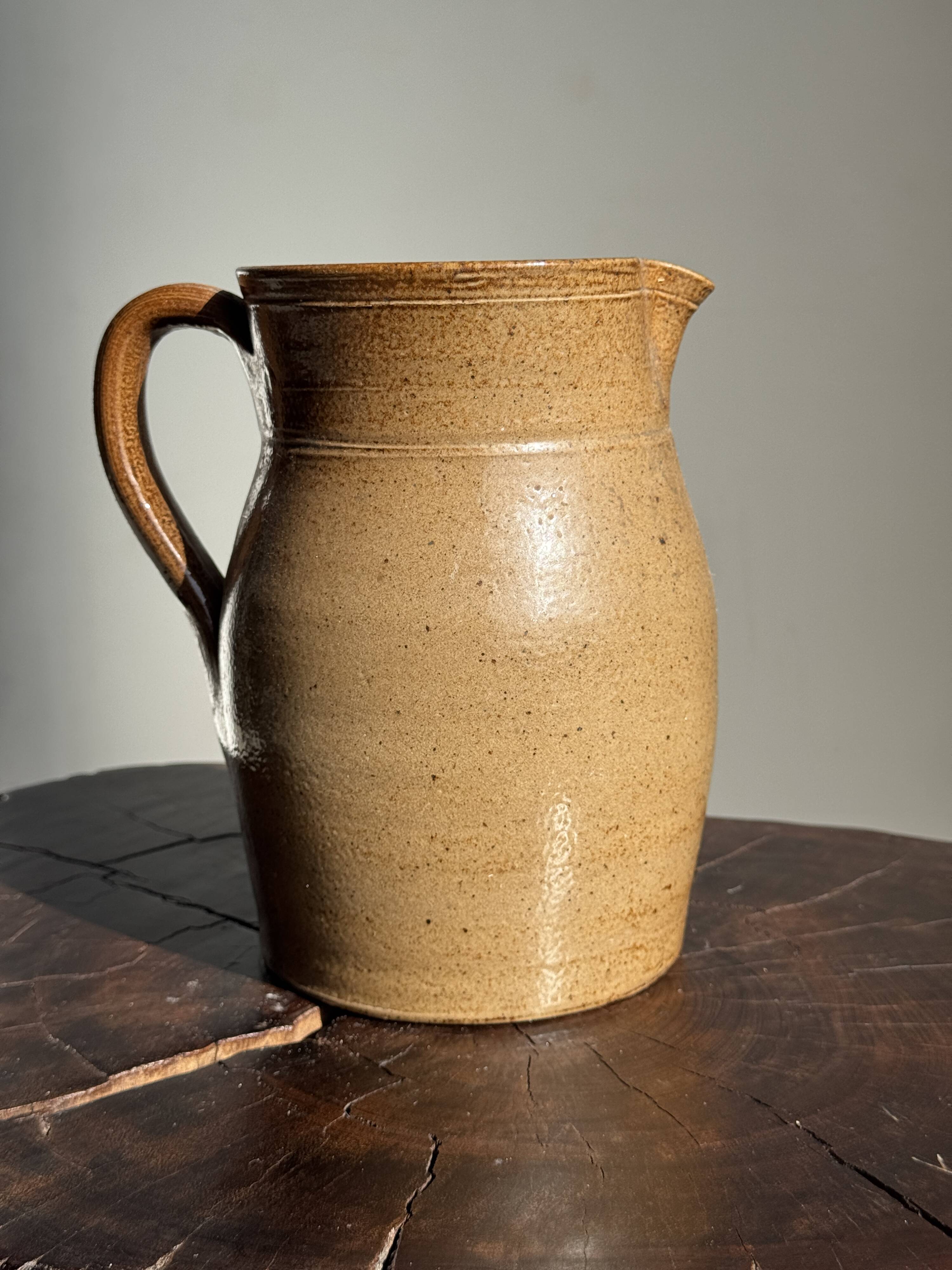 Large stoneware jug marked with pencil underneath H20 D11.