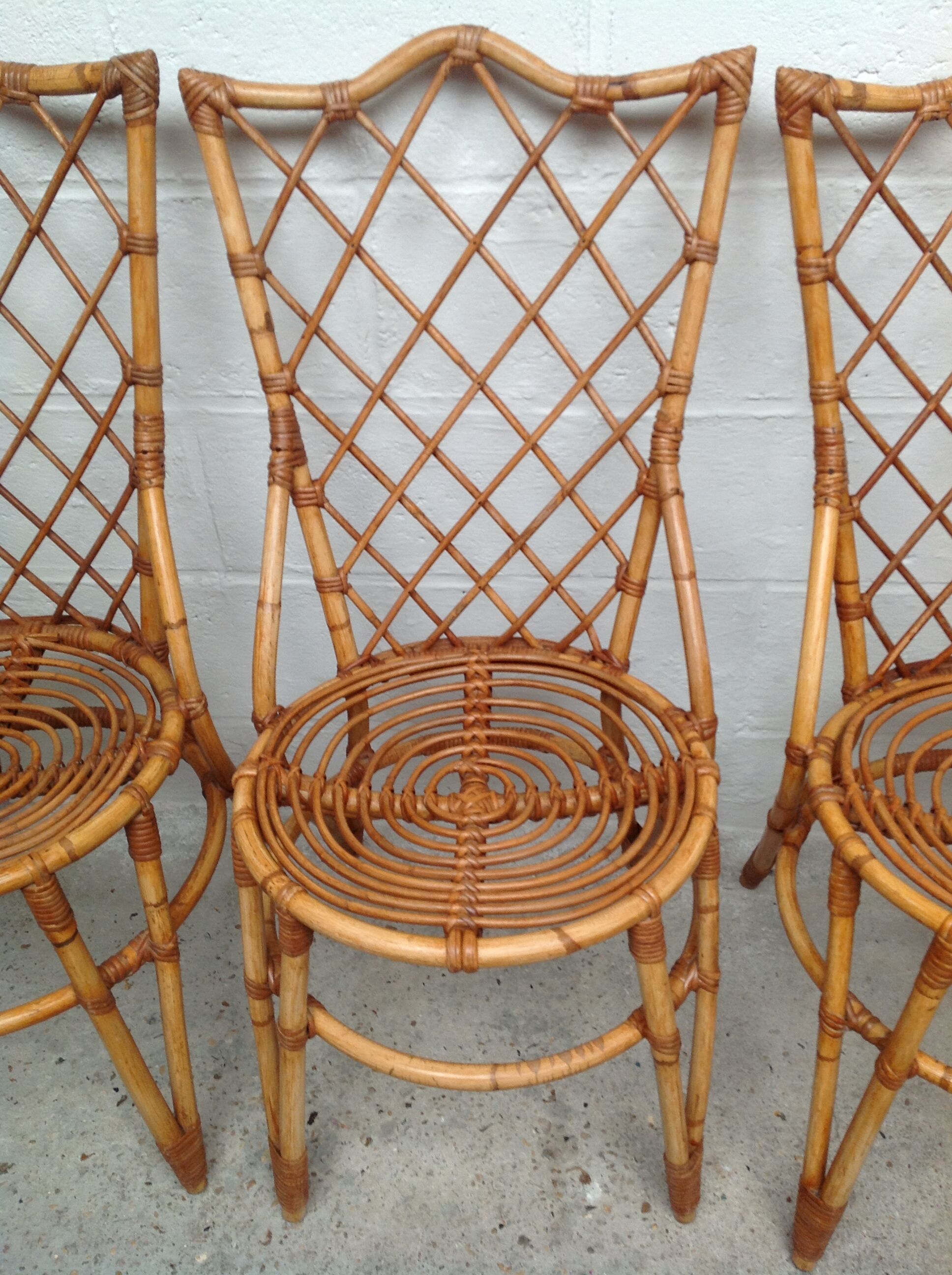 Rattan chairs by Louis Sognot
