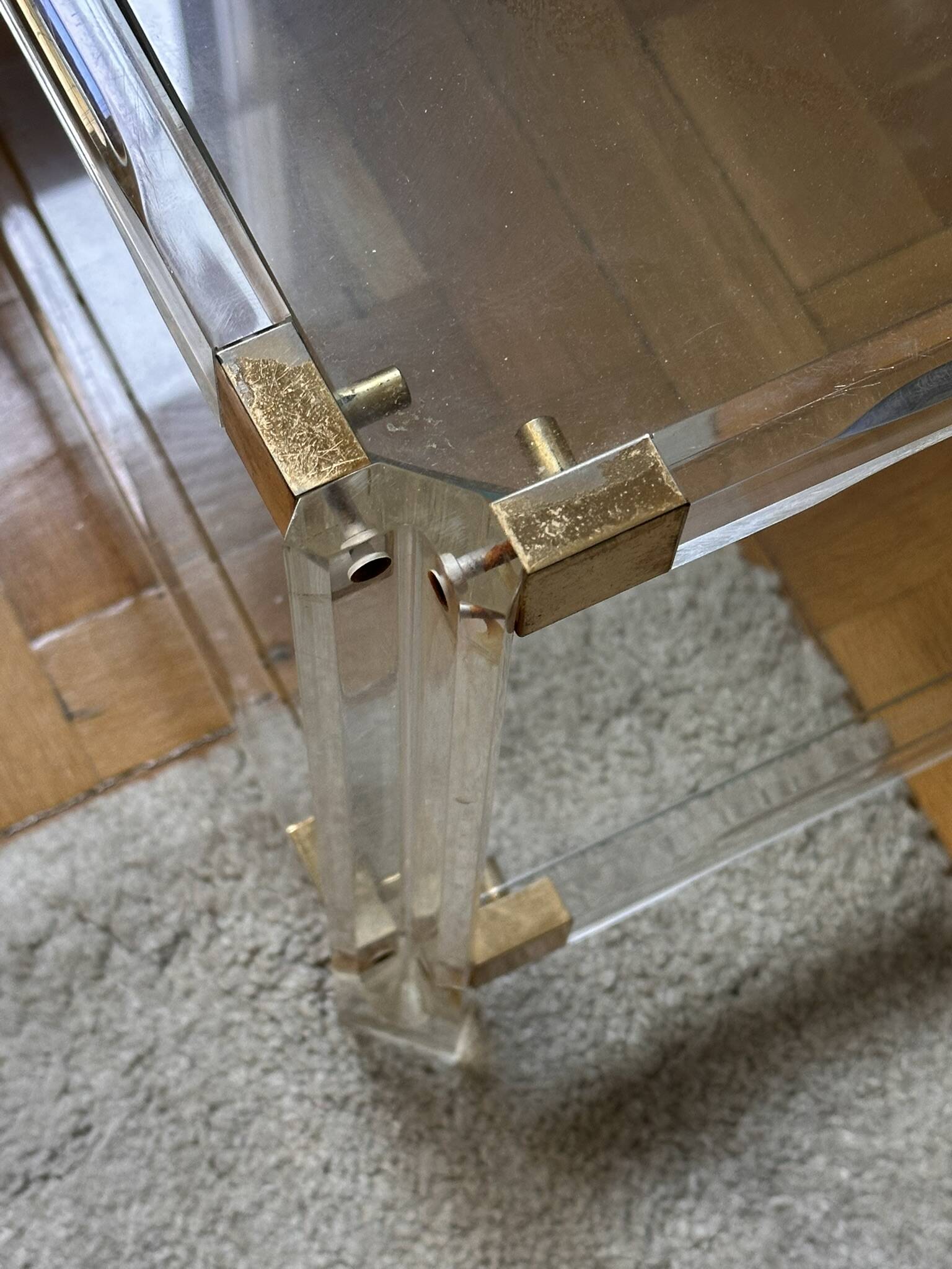 2 side tables in plexiglass, glass, and brass.