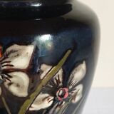 Old enameled earthenware vase with daffodils early 20th century