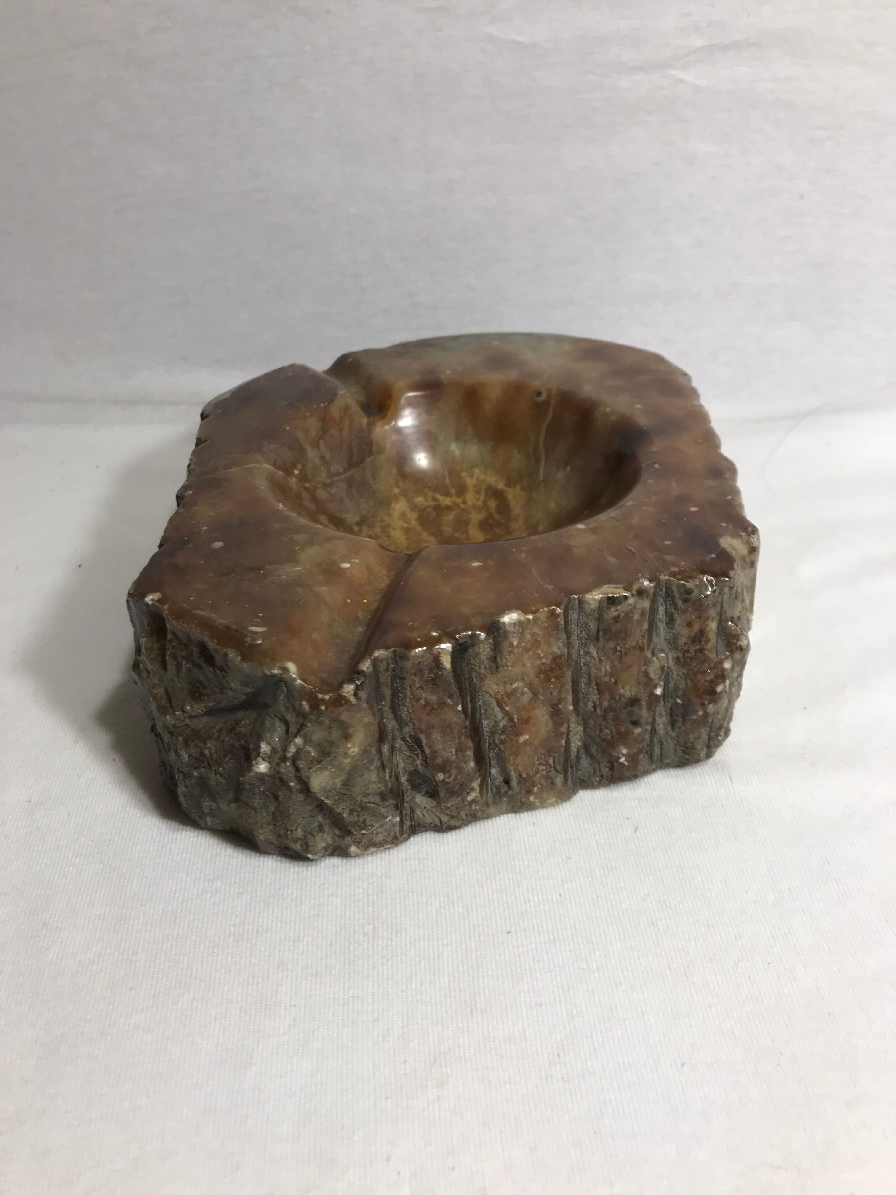 Ashtray old polished stone