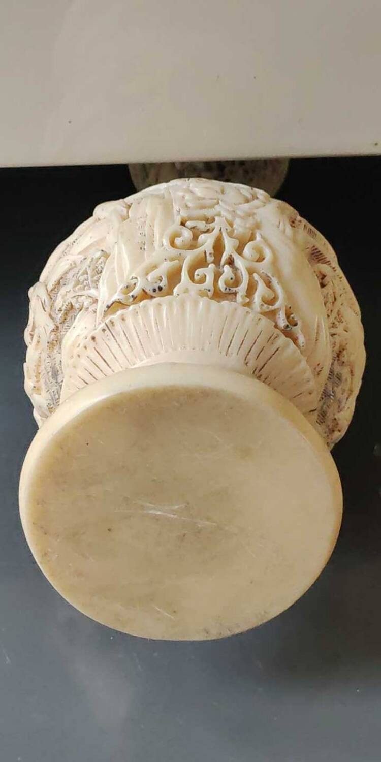 Asian-inspired ball vase. In beige cinnabar lacquer. Scenes of life decor. Arabesque and floral friezes. Height 24 cm