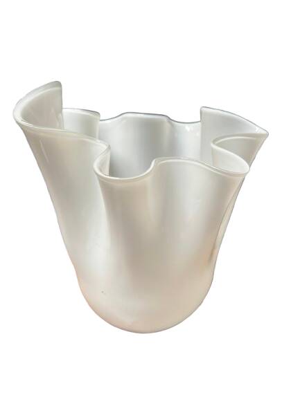 White glass vase in corolla shape