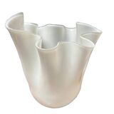 White glass vase in corolla shape