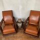 PAIR OF BRUTALIST ARMCHAIRS IN TEAK AND VINTAGE COGNAC LEATHER FROM THE 1950S