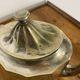 Art Deco silver-plated teapot with faceted decoration.