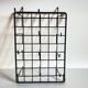 Vintage black metal wall loom display