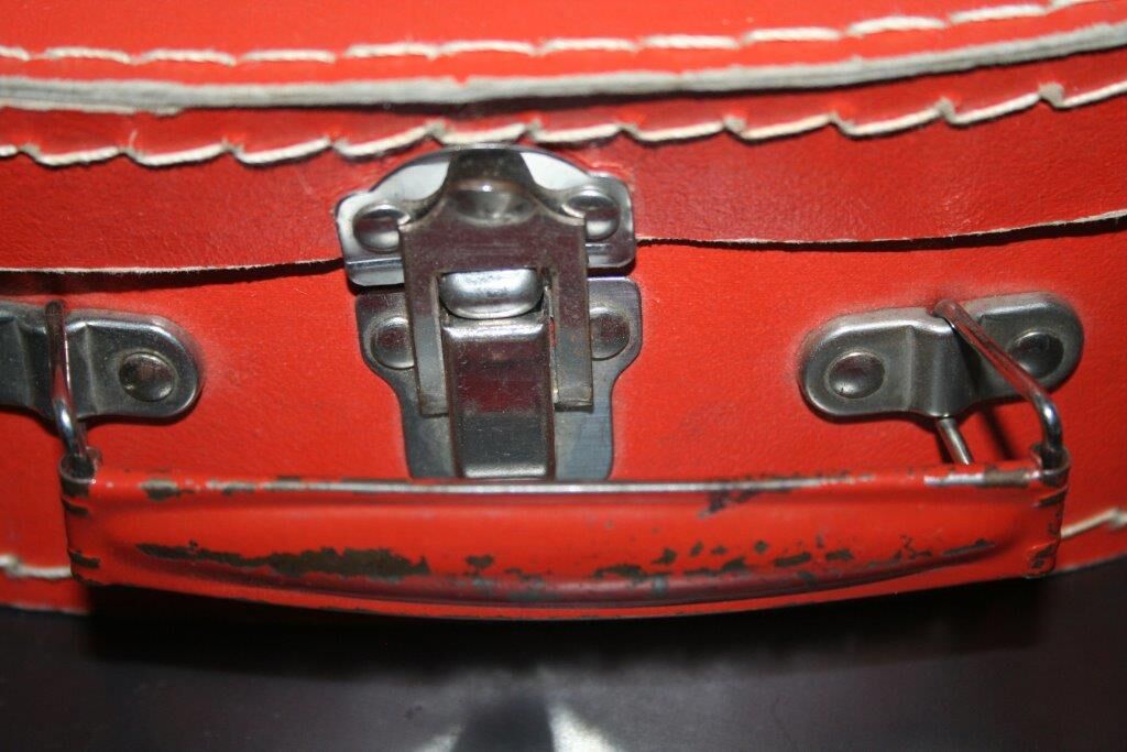 Small suitcase cardboard orange