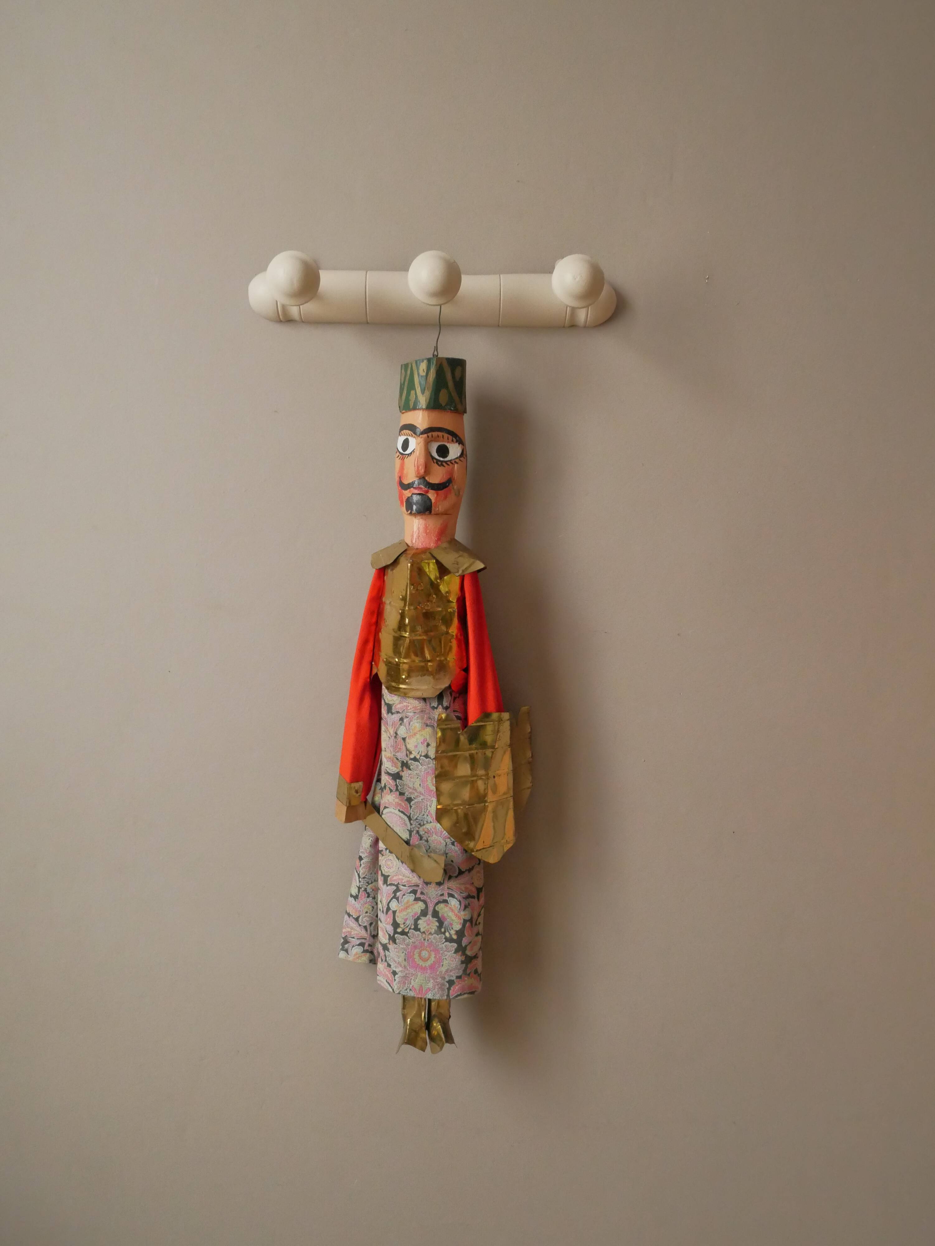 Old Turkish decorative puppet in wood and gilded metal, old toy, handcrafted