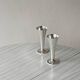 Two silver-coloured lightweight metal flower vases.