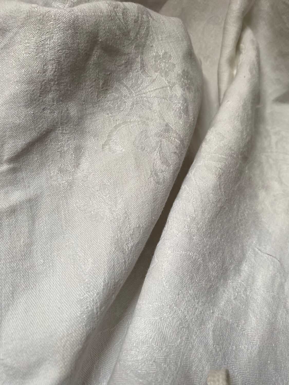 Large white cotton tea towel with damask thread.