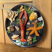 Unusual vintage wall plate seafood curiosity cabinet