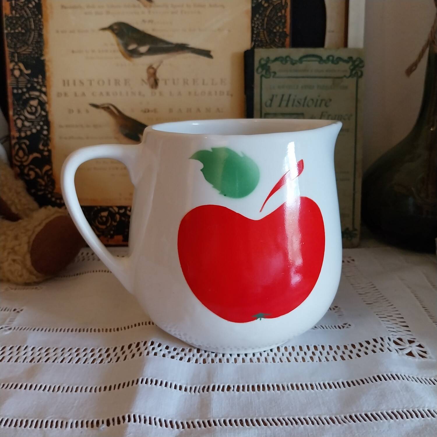 Vintage ceramic carafe with apple decor