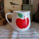 Vintage ceramic carafe with apple decor
