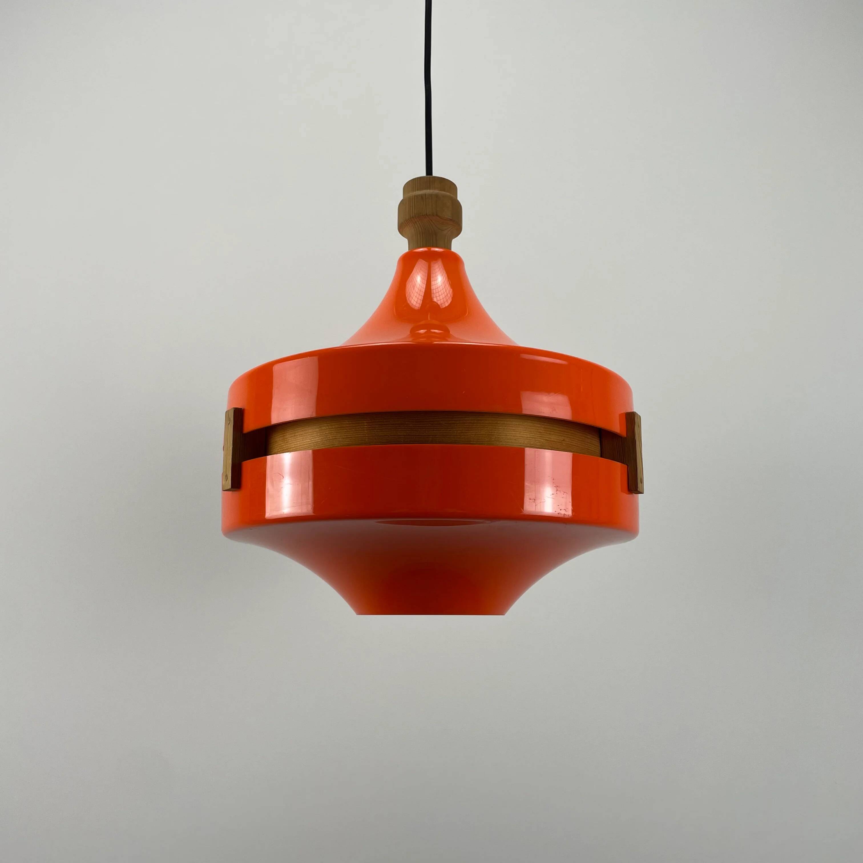 1970s orange Scandinavian suspension light in plexiglass shaped like a UFO.