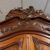 Armoire a coquilles de style Louis XV en acajou vers 1850