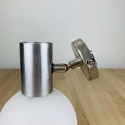 Space age opaline globe wall light, adjustable, and brushed metal, 1960s.
