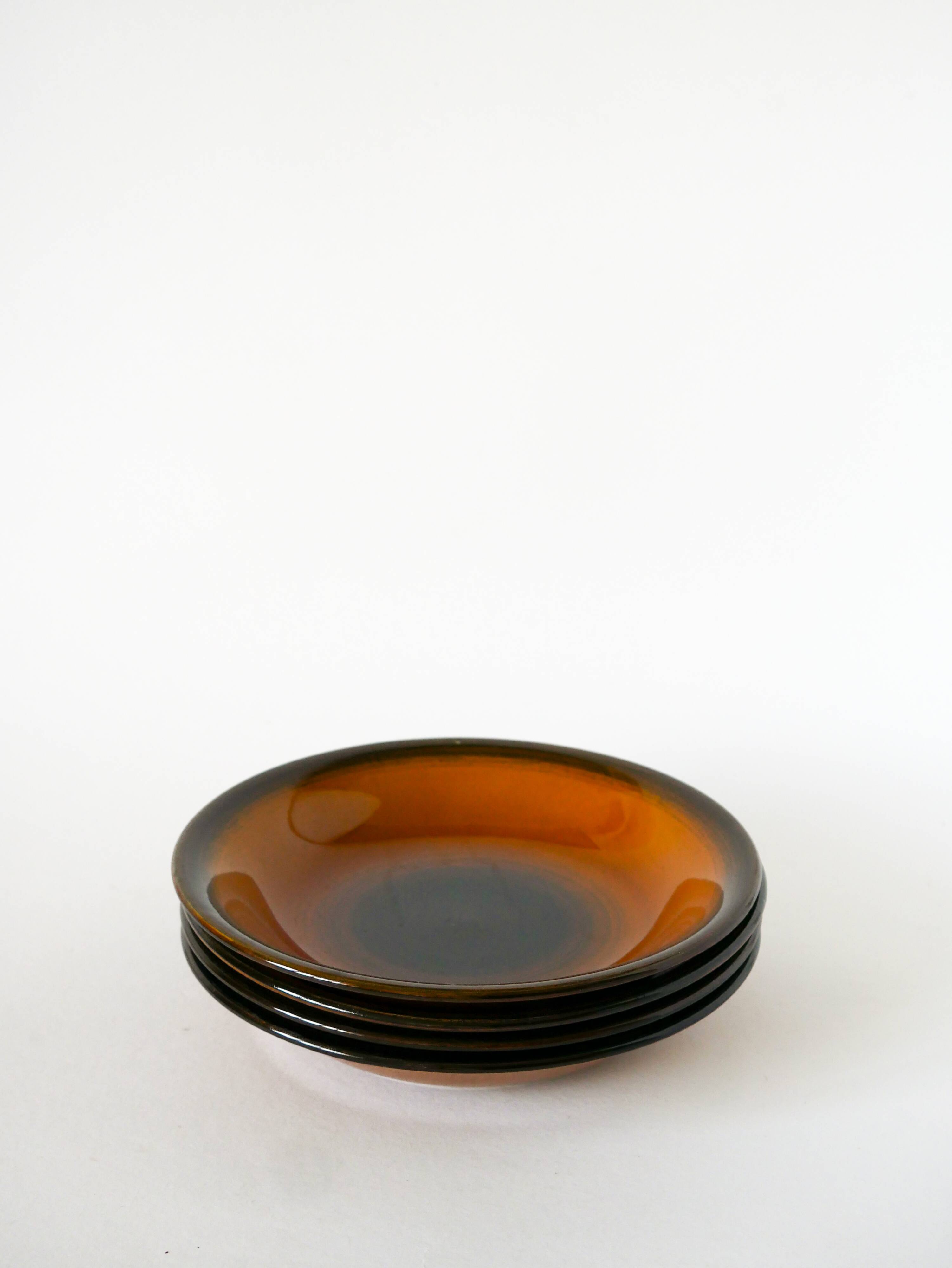 Set of 4 glazed ceramic deep plates, Longchamp, 1960