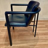 Set of 3 designer leather and metal armchairs.