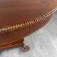 Oval Empire-style table with a central pedestal, 19th century.