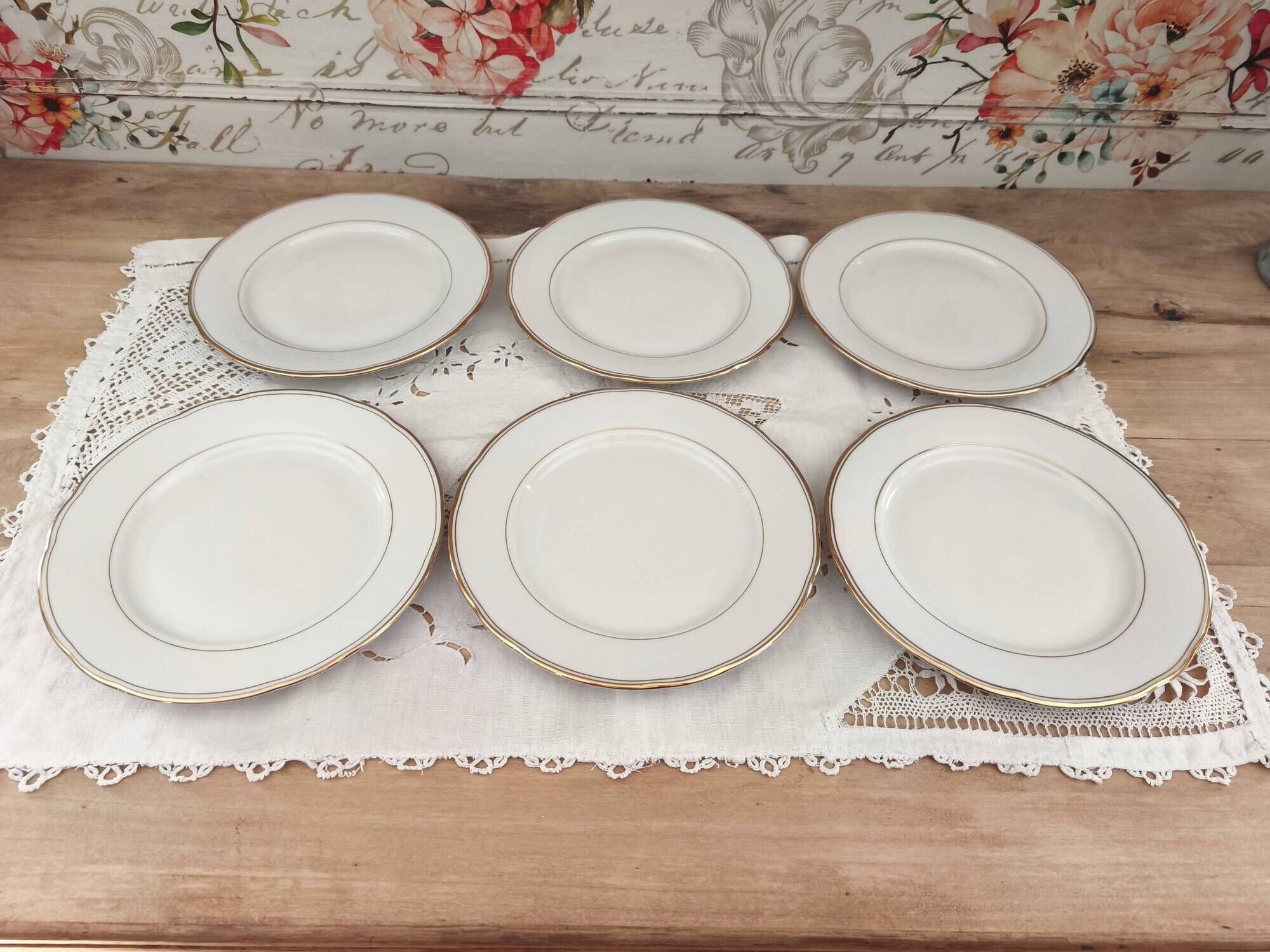 Set of 6 fine porcelain dessert plates from Bohemia with a gold rim.