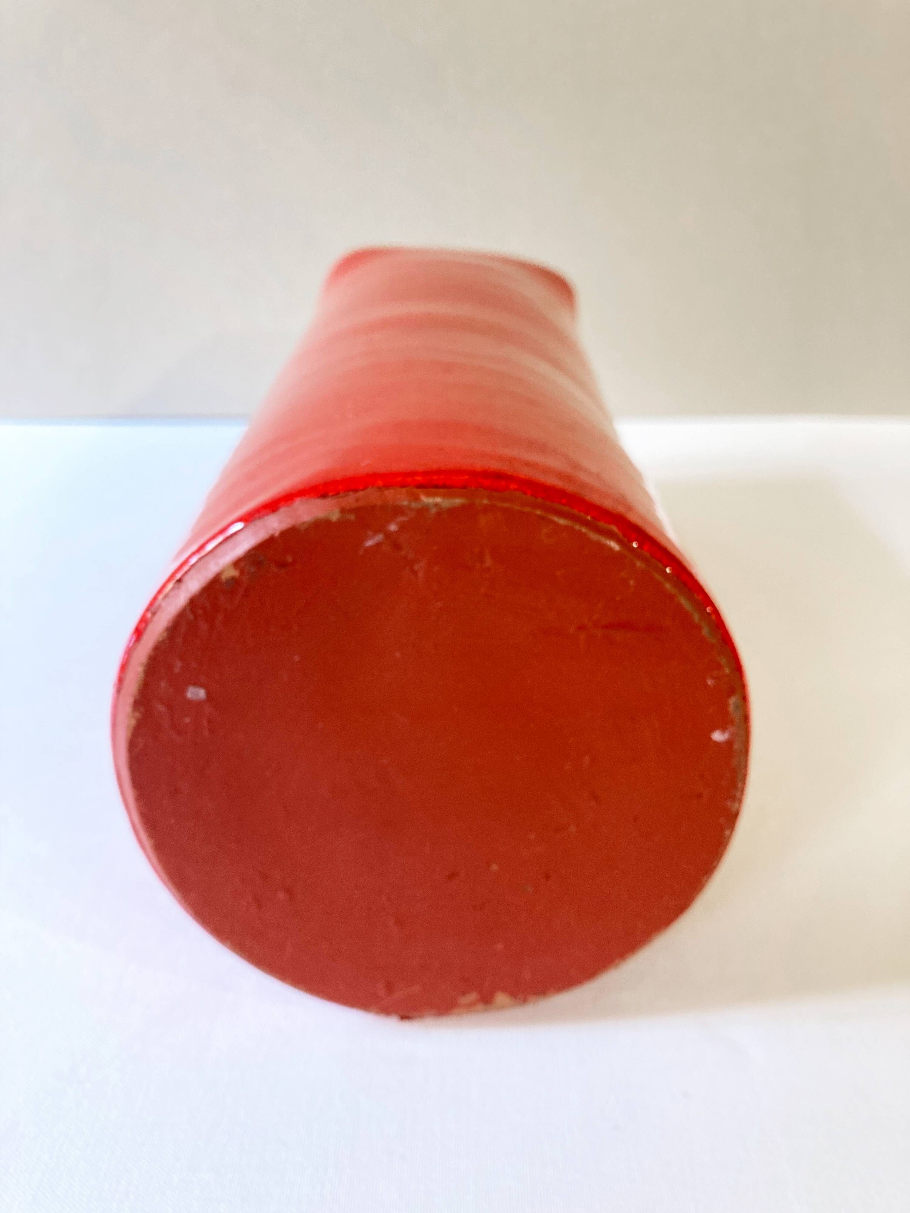 Large red glazed ceramic vase