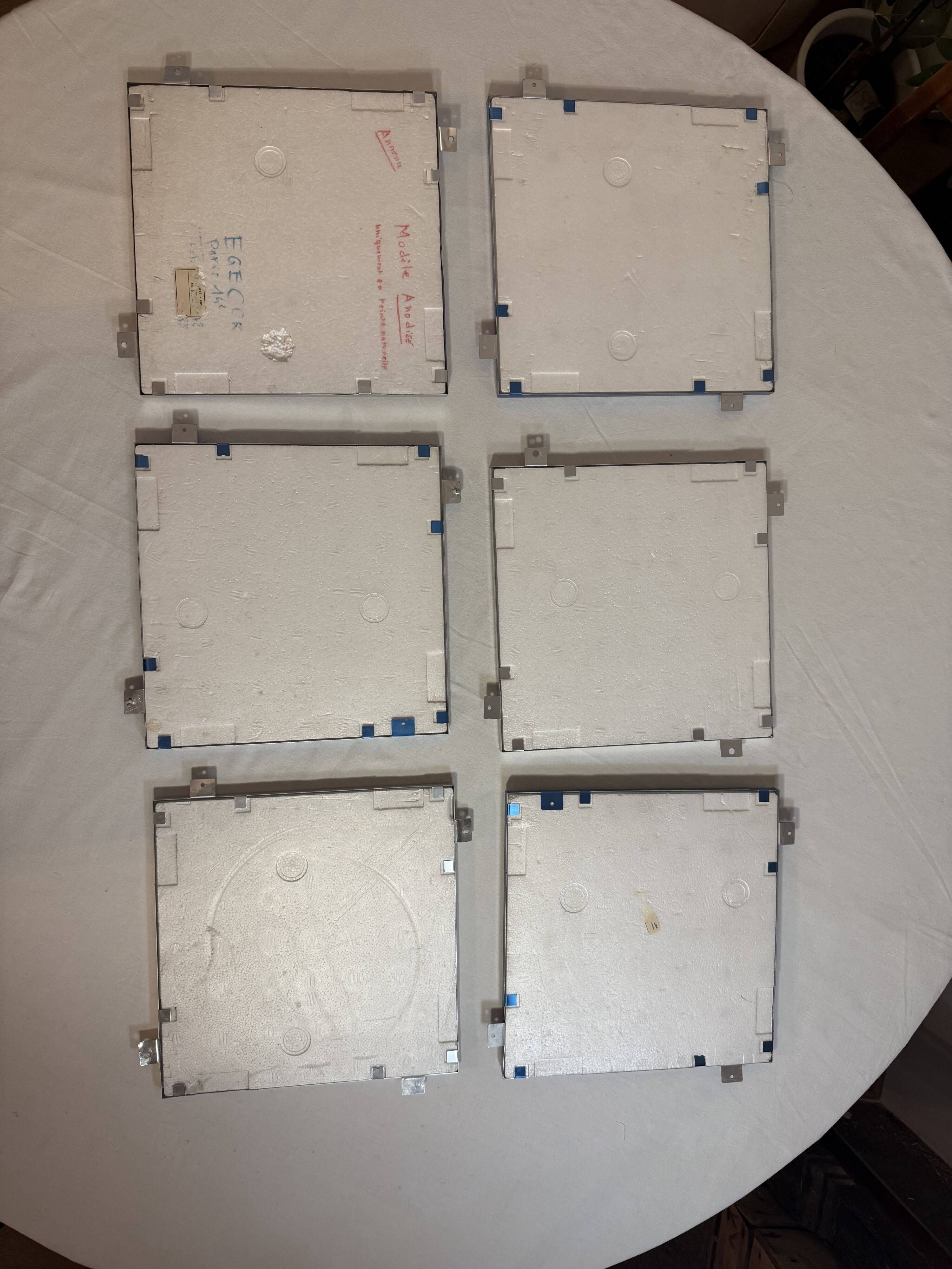 Set of 6 Space Age wall plaques, made of metal, geometric patterns.