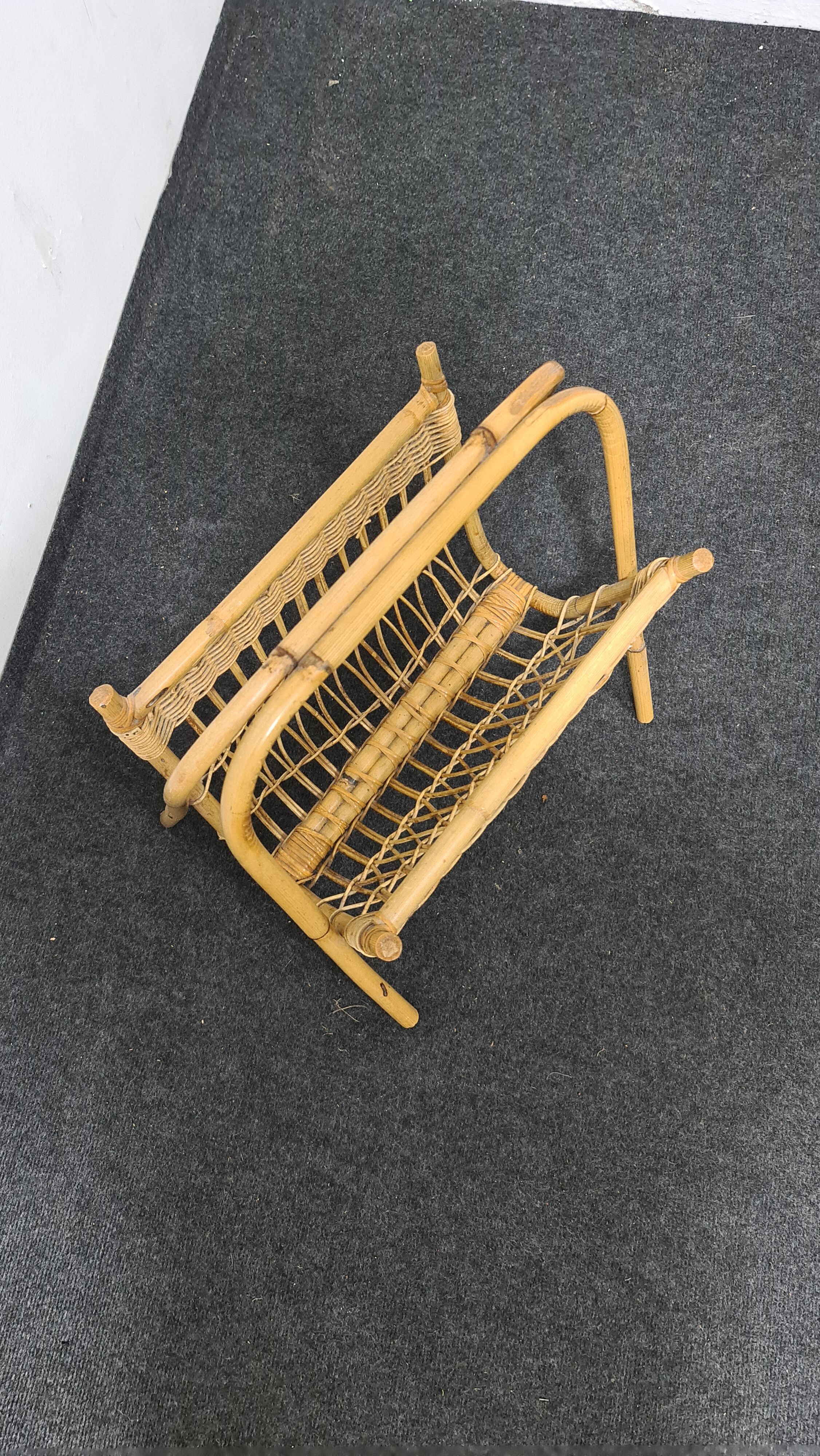 Vintage wicker paper or magazine rack