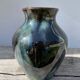 Signed ceramic flamed vase