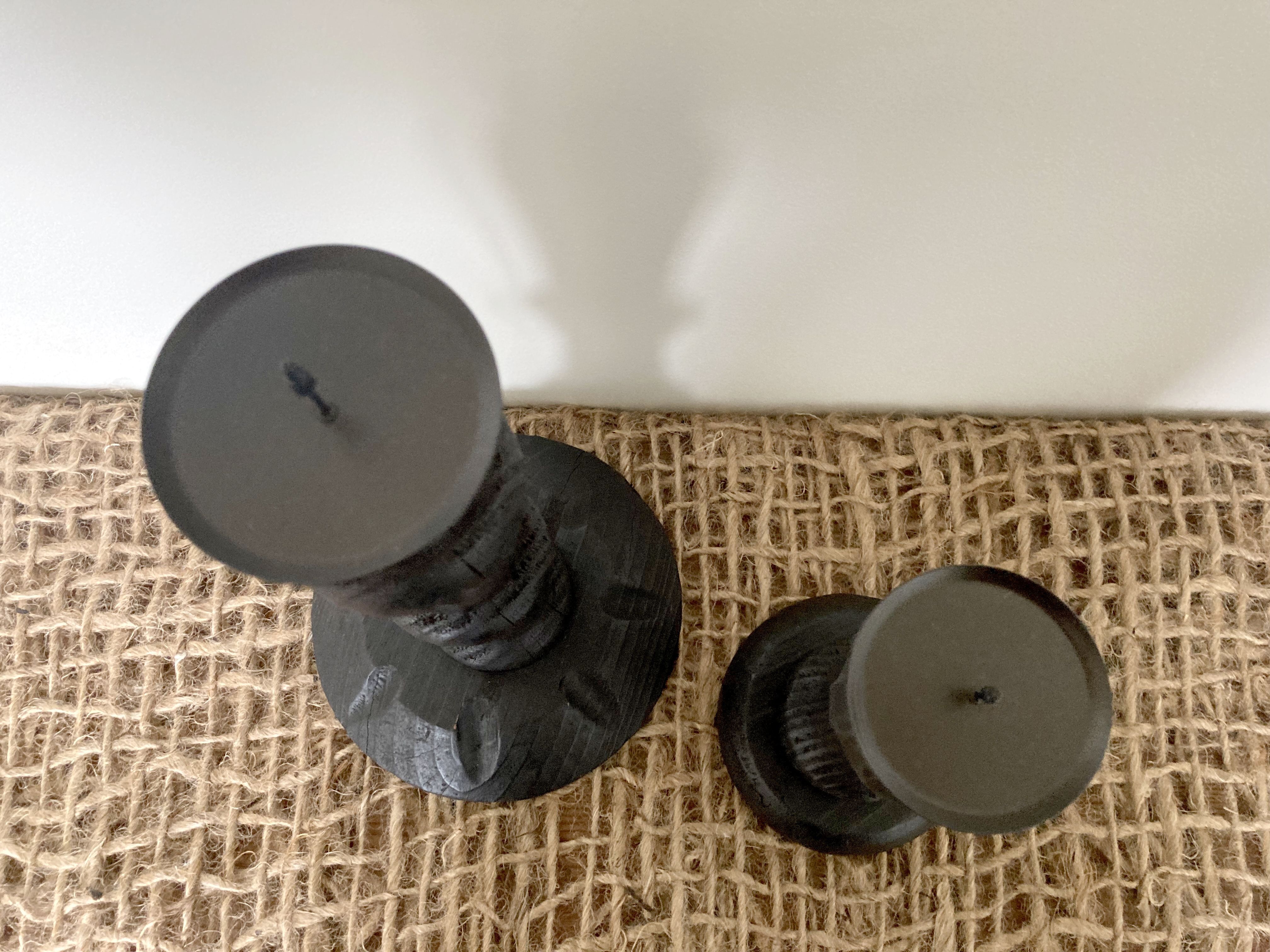 Black wooden candlesticks