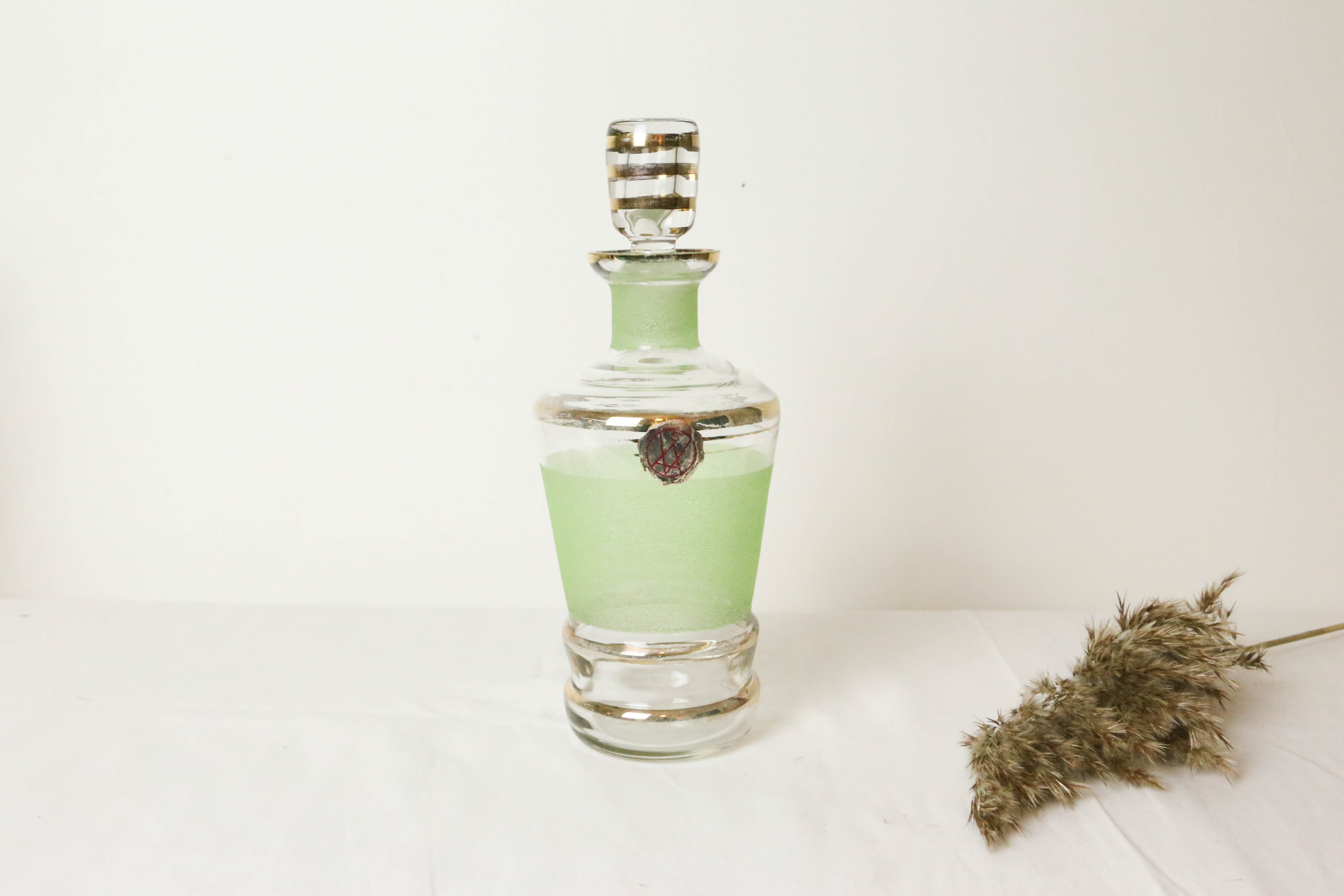 Carafe en verre granité vert, vintage