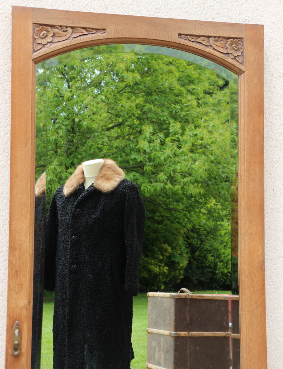 Beveled floor mirror on art deco frame