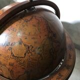 Rolling globe bar