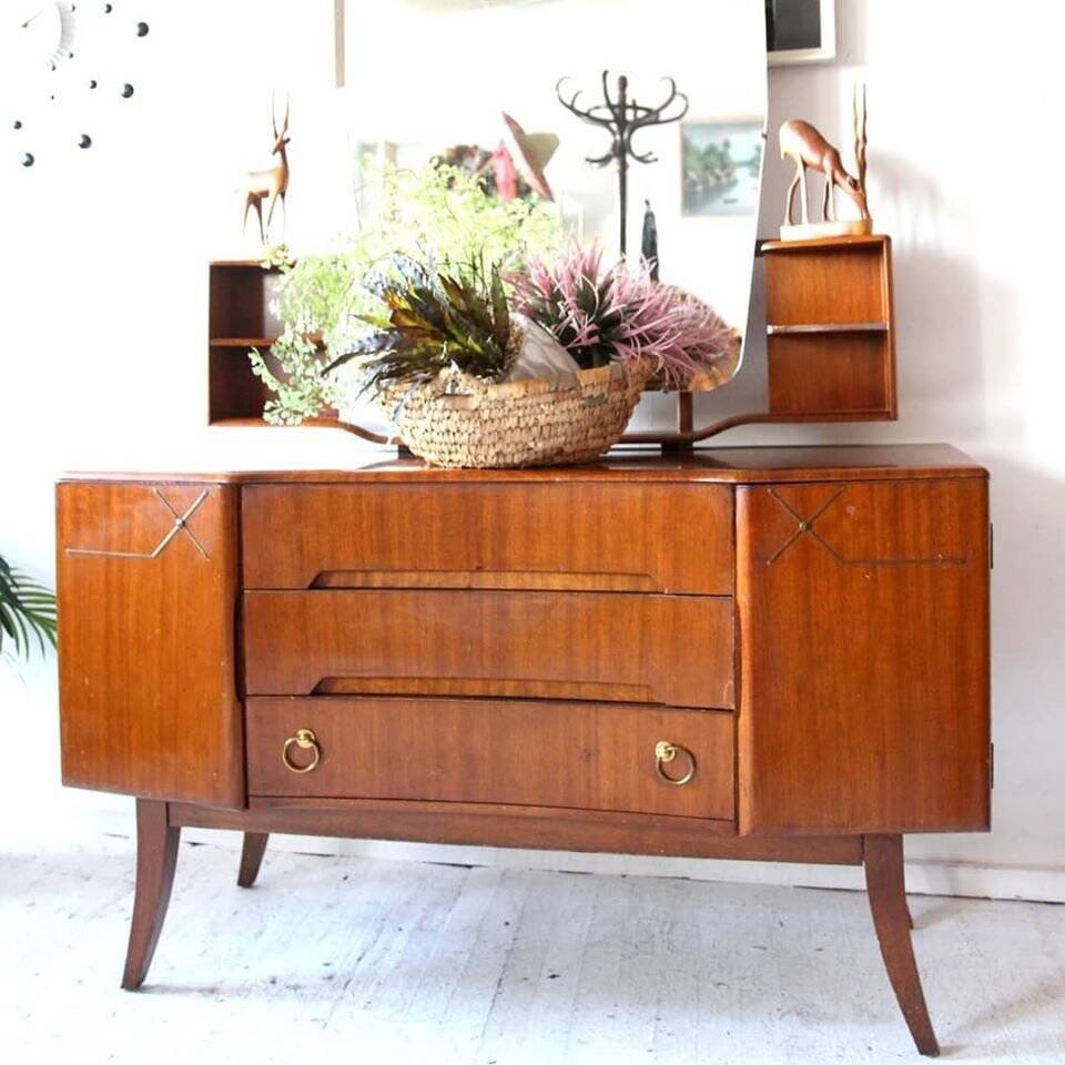 Vintage 1950s brown wooden dressing table with a double mirror and integrated storage.