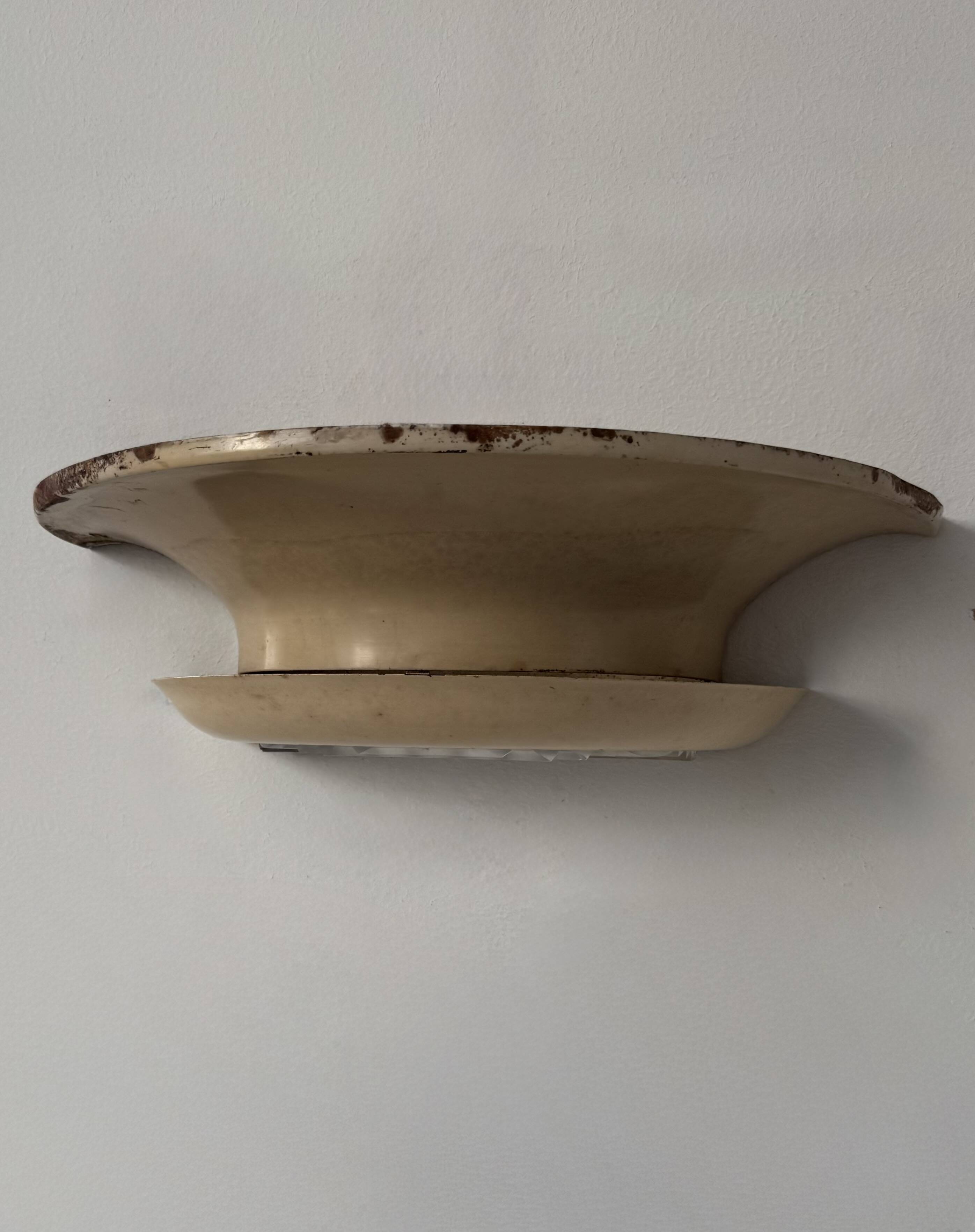 Pair of vintage modernist wall lights, beige painted metal and glass, France, 1930