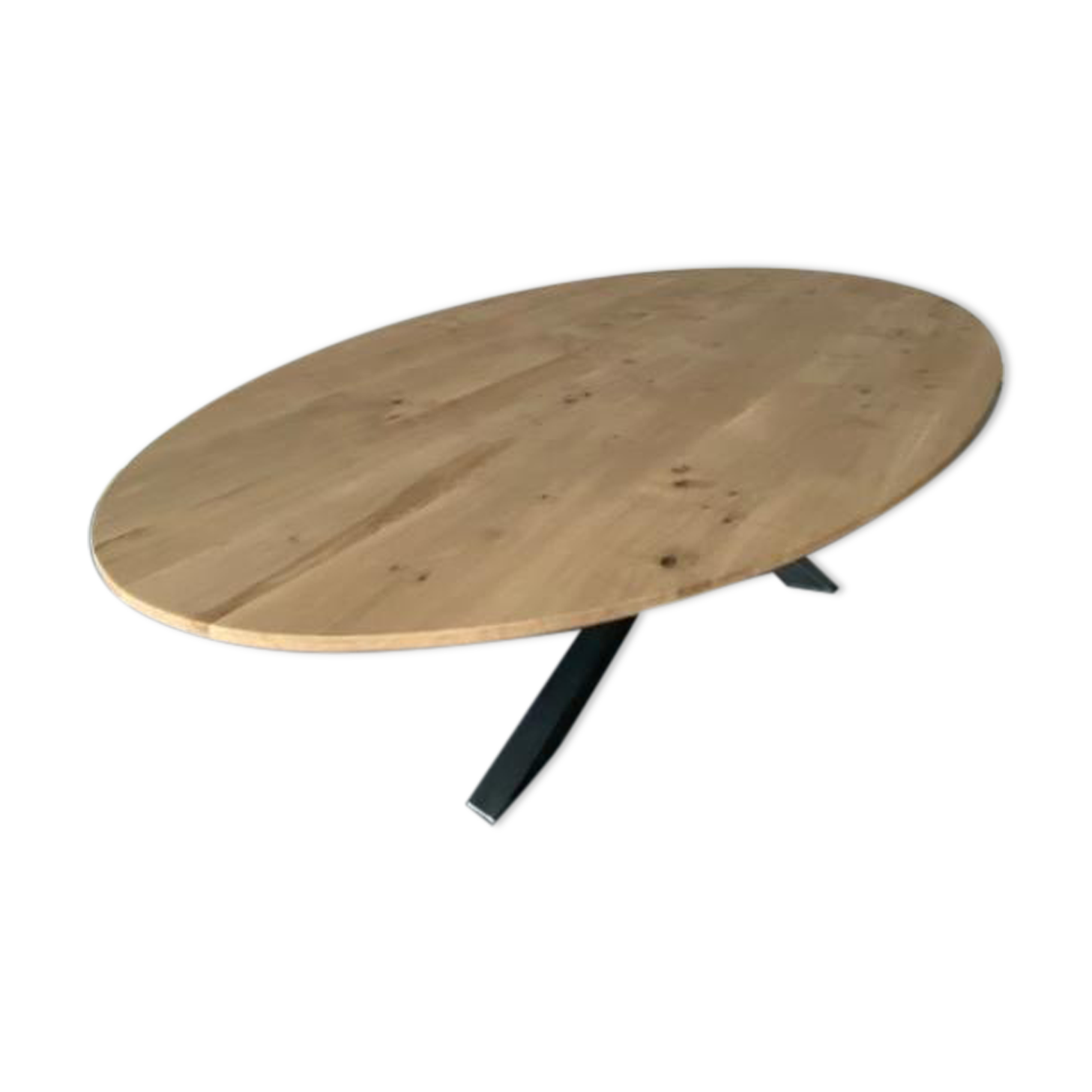 Oval table in solid oak refined edges with central foot in black metal