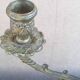 Three-light chandelier in brass metal