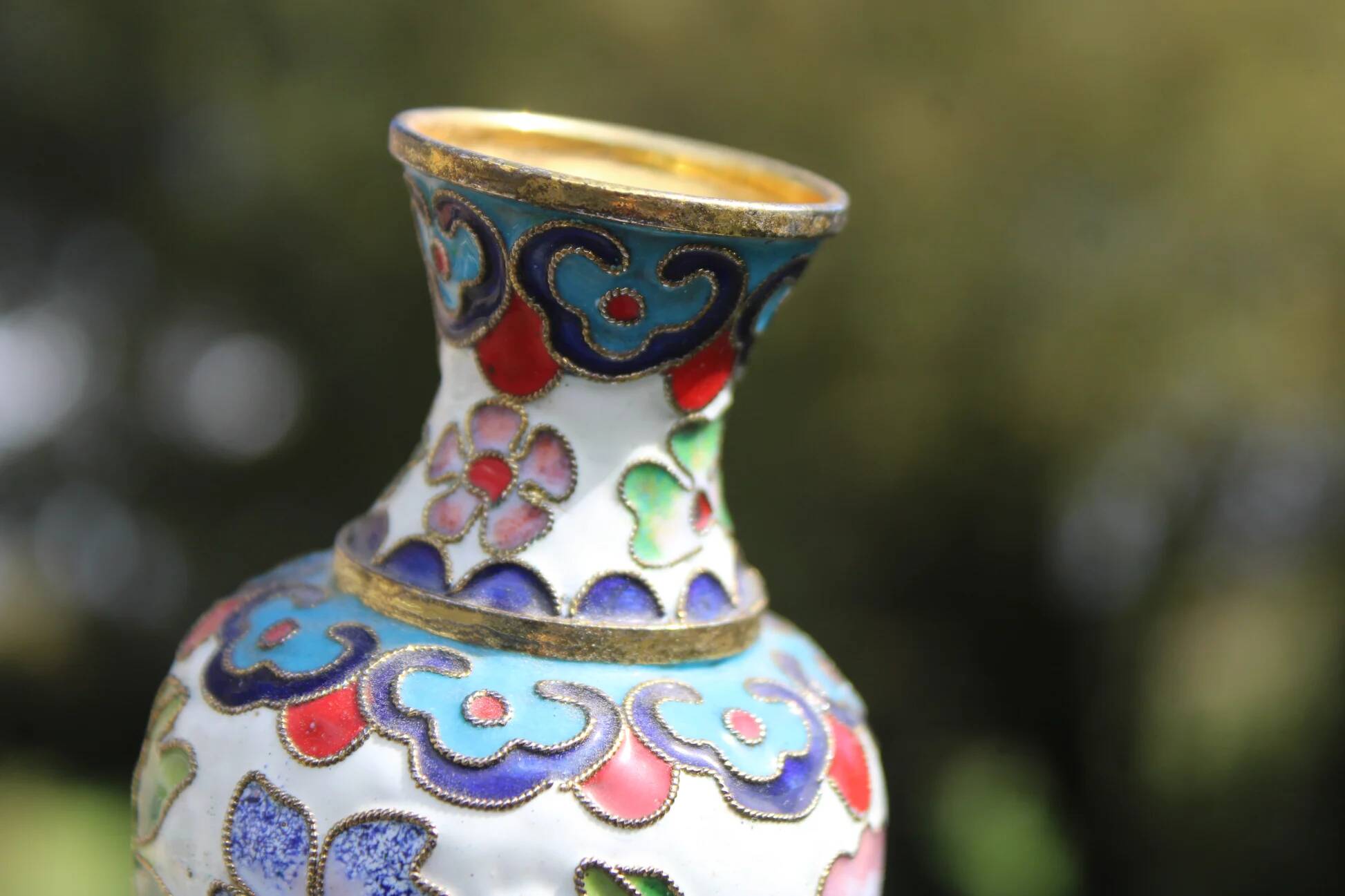 Two small vintage cloisonné enamel vases with Asian floral decoration.