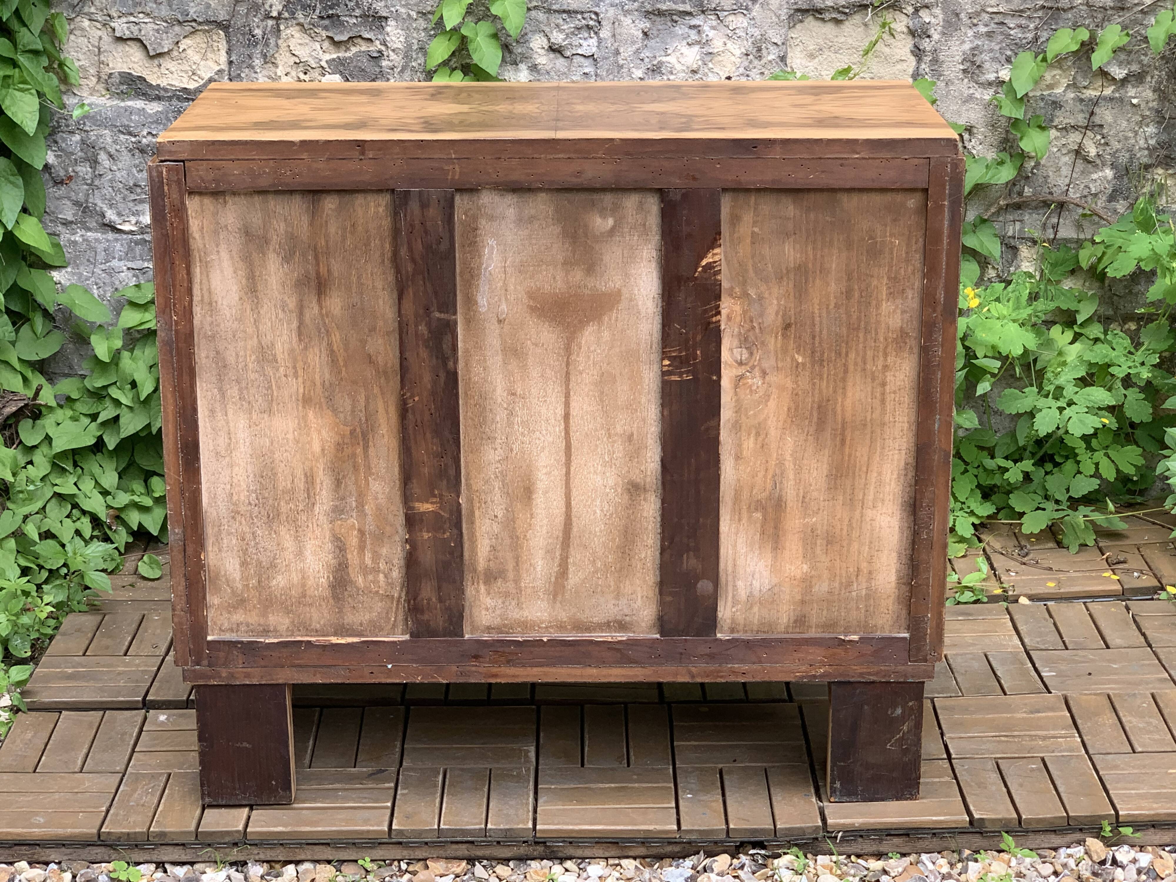 Art Deco chest of drawers in raw walnut burl