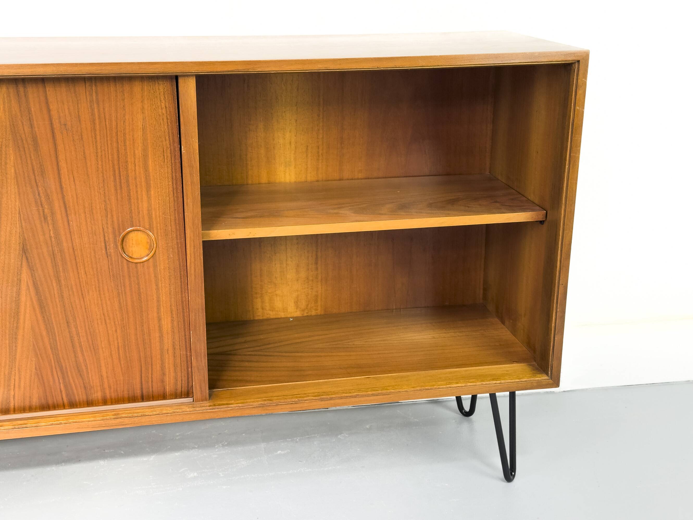 Walnut sideboard with sliding doors by Franzmeyer, 1959