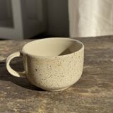 Set of 4 vintage speckled beige stoneware coffee cups.