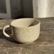 Set of 4 vintage speckled beige stoneware coffee cups.