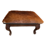 Vintage wooden and goatskin pouf