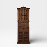 Antique Spanish wardrobe with three sections — carved drop front & wrought iron