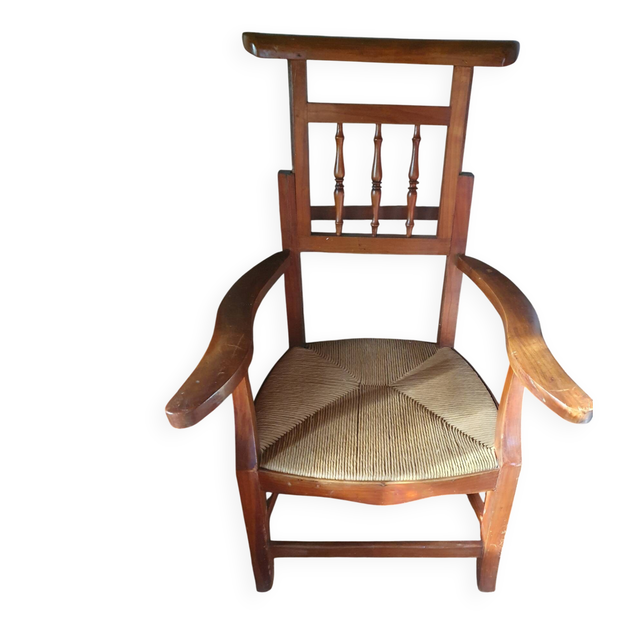 Beau fauteuil ancien au dossier haussable et assise en paille